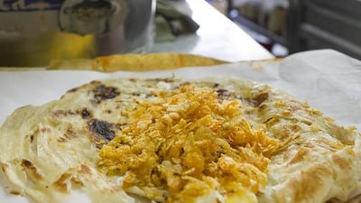 New York has cheesecake; Philadelphia has cheesesteaks. Chicago has deep-dish pizza, and the UAE – it has the Chips Oman sandwich. Mona Al Marzooqi / The National