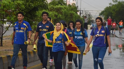 Sri Lankan cricket fans arrive at the National Cricket Stadium ahead of the one-day international between Pakistan and Sri Lanka in Karachi. AFP