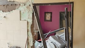A damaged apartment at the site of an overnight Israeli air strike on Beirut's southern suburbs. AFP