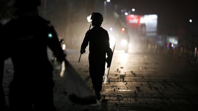Police officers hold shields to protect from stone pelting during a protest, after dispersing the supporters of the Tehrik-e-Labaik Pakistan Islamist political party, in Karachi, Pakistan. Reuters
