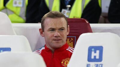 Wayne Rooney of Manchester United looks on from the substitutes bench during the FA Cup, sixth round replay between West Ham United and Manchester United at the Boleyn Ground on April 13, 2016 in London, England. (Photo by Ian Walton/Getty Images)