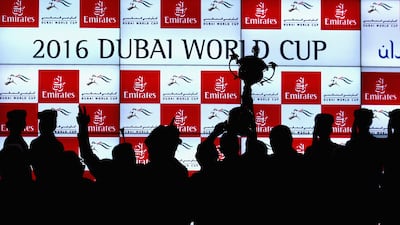 Team California Chrome celebrates with the trophy after victory in the Dubai World Cup of horse racing in 2016, sponsored by Emirates. Getty Images