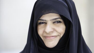 Hessa Hassan Al Jaber says the struggle of raising four children who had no hearing difficulties, intensified four years ago when her husband, who was also deaf, died. Jaime Puebla / The National