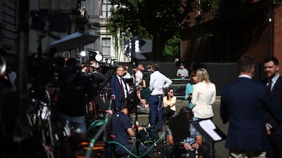 The media gathered outside 10 Downing Street. AFP