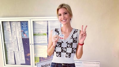 Ivanka Trump, wearing a grey-and-black yin and yang sign tank top and jeans, poses at a voting booth during the US 2022 Midterm Elections on November 7, 2022. Photo: Instagram / Ivanka Trump