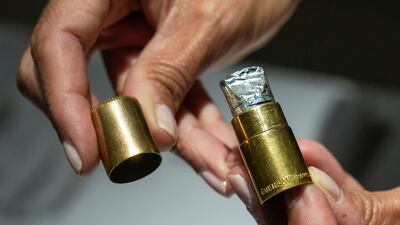 The first lipstick in history, a pink wax stick named Ne m'oubliez pas or Forget me not, invented by Guerlain in 1870