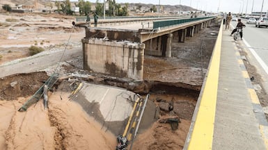 This photograph shows a collapsed bridge in the Iraqi town of Tuz Khurmatu, on the main road linking Kirkuk to the capital Baghdad, after heavy rains in the country’s northern provinces. AFP