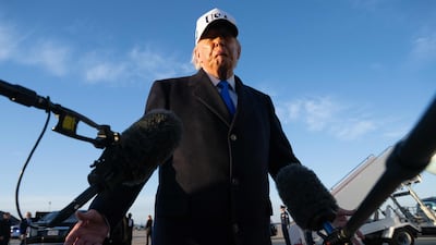 US President Donald Trump speaks to reporters before boarding Air Force One as he departs Joint Base Andrews in Maryland on March 13, 2026. President Trump is heading to Florida to spend the weekend at his Mar-a-Lago resort. (Photo by SAUL LOEB / AFP)