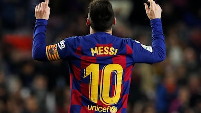 Barcelona's Lionel Messi celebrates scoring his hat-trick. Reuters