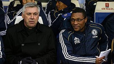 Carlo Ancelotti, left, the Chelsea manager, alongside his new first-team assistant manager Michael Emenalo, during yesterday’s game against Birmingham City.