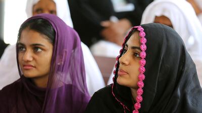 Pakistani pilgrims attend briefing session at Hajj Complex in preparation to travel to Saudi Arabia to perform Hajj, Friday, Aug. 10, 2018 in Islamabad, Pakistan. A total of 185,000 Pakistanis will be performing the pilgrimage this year. In order to facilitate the pilgrims, the government of Pakistan makes requisite arrangements, including the set-up of special vaccination camps. AP
