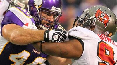 After 13 NFL seasons, Jim Kleinsasser of the Minnesota Vikings, left, has decided to walk away from the game while he still can, 'without a limp'.
