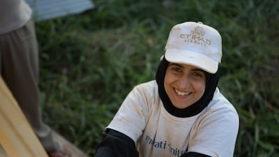 Jameela Al Baloushi, an Emirati law student from Al Ain University, was one of the volunteers working on the housing project. Photo courtesy Amelia Johnson