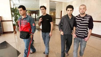 The eight men where caught in transit while awaiting permission from Egyptian officials to return to Palestine through the Rafah border.