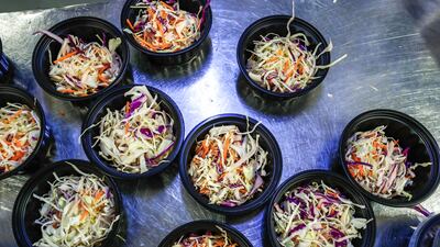 Salad boxes are prepared.