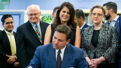 'Right now, I have what we think is the strongest election integrity measures in the country,' Florida Governor Ron DeSantis said as he signed the voting bill. Miami Herald via AP
