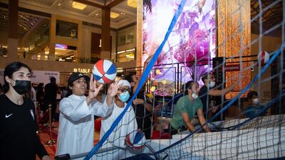 Fans can test out their basketball skills at pop-a-shots.