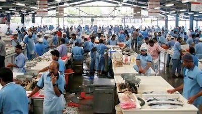 Most of the catch by UAE fishermen is sold at dockside auctions by traders who then pass it on to local markets and processing plants. Above, the fish market in Deira.