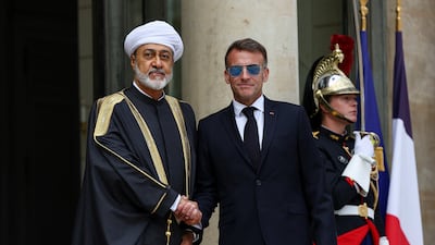 Oman's Sultan Haitham is received by French President Emmanuel Macron on his first state visit to France. Reuters