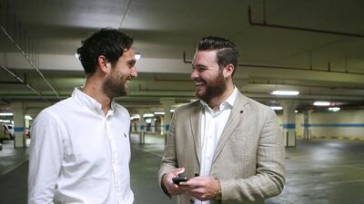 Craig McDonald, right, and Harrison Jones, co-founders of YallaParking, discuss on an ‘Airbnb’ type app for unused parking spaces in Dubai. Ravindranath K / The National