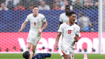 England's Jude Bellingham is challenged by Leandro Paredes of Argentina. AFP