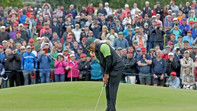 Tiger Woods putts on the first green on the first day of the JP McManus Pro-Am. AFP
