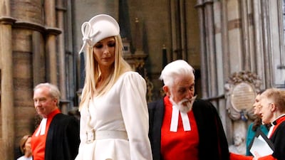 Ivanka Trump, wearing a white coat dress, is shown around Westminster Abbey in London, England on June 3, 2019. Getty Images