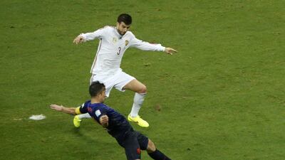 Robin van Persie shoots to score his second goal of the night, Netherlands' fourth, in a 5-1 win over Spain at the 2014 World Cup on Friday in Salvador, Brazil. Fabrizio Bensch / Reuters