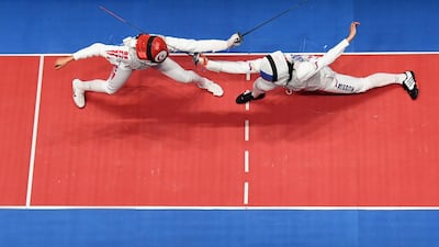 Ines Boubakri, left, and Aida Shanaeva of Russia compete during the bronze medal bout at Rio in 2016. Getty Images