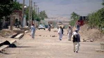Military vehicles patrol in Pul-e-Alam, in Logar province, Afghanistan where the strength of the Taliban is a cause of widespread concern.