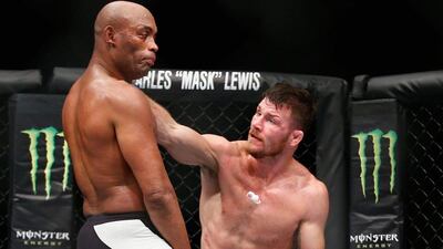 LONDON, ENGLAND - FEBRUARY 27: Michael Bisping of Great Britain (R) knocks out the gumshield of Anderson Silva of Brazil which leads to confusion as Silva fights on without his gumshield during the Middleweight Bout of the UFC Fight Night at The O2 Arena on February 27, 2016 in London, England. (Photo by Christopher Lee/Getty Images)