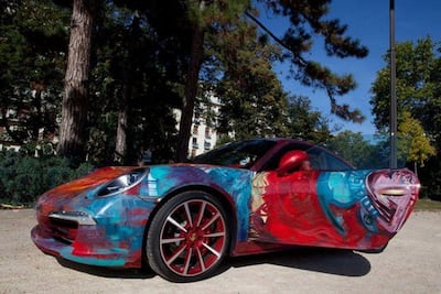 Shalimar Sharbatly, part of the 'Moving Art' school, hand-paints customised sports cars. Courtesy the artist