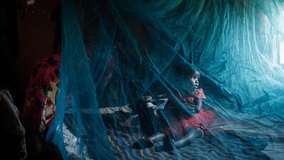Ruth Kavere, 65, and her granddaughter Faith, 3, who completed doses through the world’s first malaria vaccine pilot programme, at home in Mukuli, Kenya. AFP