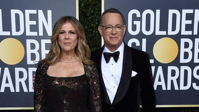 Rita Wilson, left, and Tom Hanks, wearing Tom Ford, arrive at the 77th annual Golden Globe Awards at the Beverly Hilton Hotel on January 5, 2020. AP