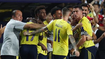 Al Nassr's Cristiano Ronaldo celebrates with teammates after Joao Felix scored their second goal. Reuters