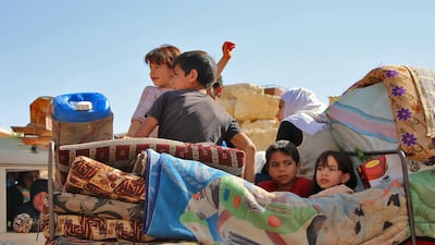 Syrian child refugees return home from Lebanon. AFP