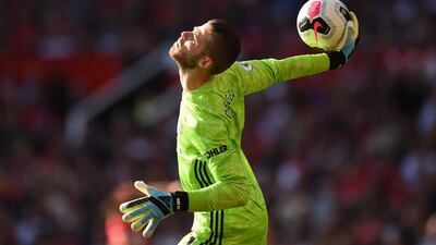 Manchester United goalkeeper David de Gea throws the ball. AFP