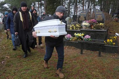 Members of the Tatar community carry the coffin of a baby in Bohoniki. Photo: EPA