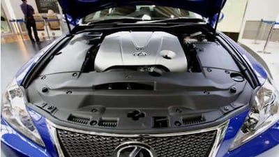 The Toyota Lexus IS 350 is displayed at a Toyota showroom in Tokyo.