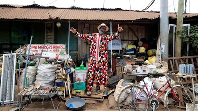 Ali Ibrahim Ambar, a trader, salutes Muslims after performing the Eid prayers in Nairobi, Kenya. Reuters
