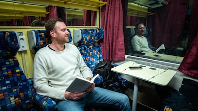 Wiebe Wakker gets a little reading in during his trip from Vienna to Bucharest.
