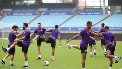 Manchester City players in action during training. Getty