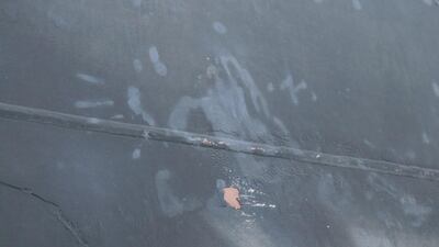 A handprint from an individual who removed an unexploded limpet mine.