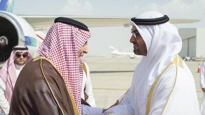 Sheikh Mohammed bin Zayed, Crown Prince of Abu Dhabi and Deputy Supreme Commander of the Armed Forces, greets Prince Saud Al Faisal, Saudi minister of foreign affairs, at the Presidential Airport. Prince Saud was among a high-level delegation to the UAE. Ryan Carter / Crown Prince Court - Abu Dhabi