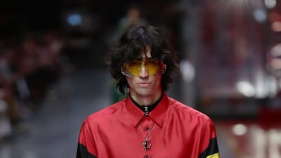 A model walks the runway at the fashion debut of the first co-ed Ferrari collection at Ferrari Factory on June 13, 2021 in Maranello, Italy. Getty Images
