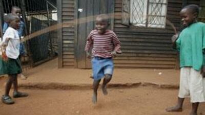 Boys play at the Just Children Foundation for orphans in Harare. Aids orphans suffer from psychological trauma, a report says.