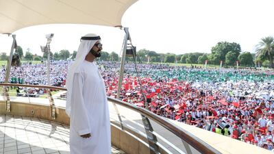 Sheikh Mohammed bin Rashid attends a flag-raising ceremony at Zabeel Park with 22,000 pupils.