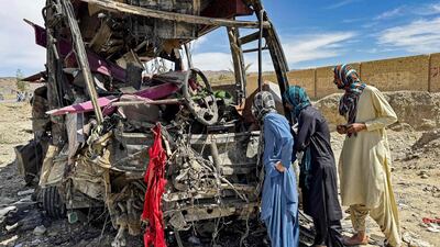 The wreckage of a bus in Noshki, Balochistan province, after a car laden with explosives hit one of seven buses of a convoy, a bombing allegedly carried out by the separatist group Baloch Liberation Army. AFP