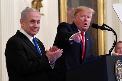 US President Donald Trump speaks during the unveiling of his Middle East peace plan with Israeli Prime Minister Benjamin Netanyahu at the White House. Susan Walsh / AP