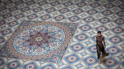 A model presents a creation by Ghanaian fashion designer Christie Brown during the Portugal Fashion show in Porto, Portugal. EPA